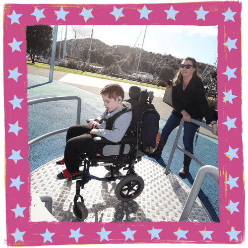 C.W.D - Kylee & Her Son Alex Aged 9 On The Wheelchair-Accessible Spinner